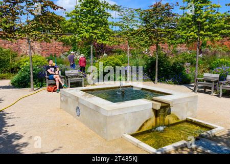 Fountain and water feature in the Paradise Garden at the RHS Bridgewater gardens, Worsley, Salford, Greater Manchester, UK Stock Photo