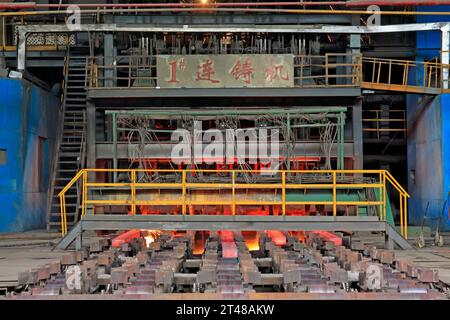 TANGSHAN - JUNE 20: continuous casting machine in a steel plant, on June 20, 2014, Tangshan city, Hebei Province, China Stock Photo