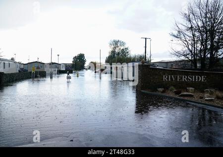 A view of the entrance to the Riverside Caravan Centre in Bognor Regis which has flooded after heavy rain the area. Residents in the South West are being warned of 'significant coastal flooding' amid heavy rain and strong winds. The Environment Agency has issued 72 flood warnings as the latest band of bad weather hits the country. Picture date: Sunday October 29, 2023. Stock Photo