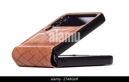 Concept of foldable smartphone folding on the shorter side - Flexible smartphone isolated on white background Stock Photo