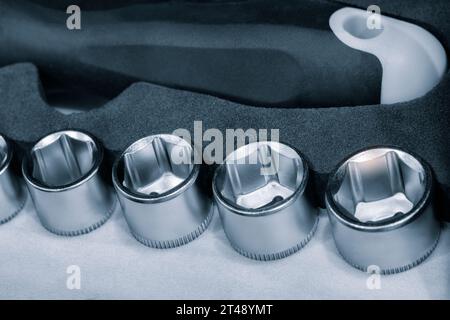 Hardware toolkit with many different garage equipment. Automobile fix background. Screwdriver metal bits set Stock Photo
