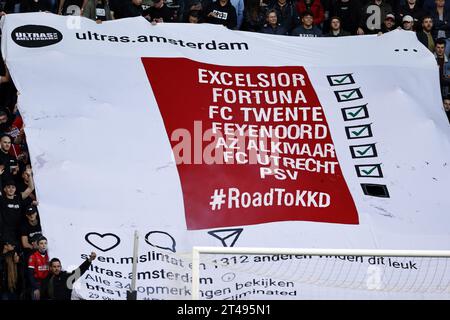 EINDHOVEN - PSV supporters with a RoadToKKD banner during the Dutch Eredivisie match between PSV Eindhoven and Ajax Amsterdam at the Phillips stadium on October 29, 2023 in Eindhoven, Netherlands. ANP MAURICE VAN STEEN Stock Photo