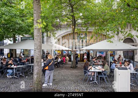 Diners seated outside the art deco McDonald's fast food restaurant in Porto, Portugal on 18 October 2023 Stock Photo