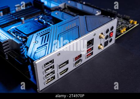 modern powerful and fast motherboard with connectors for HDMI and USB. PC hardware concept. internet cable connection slot Stock Photo