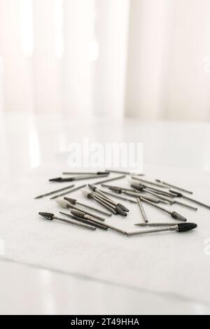Podologist's medical instruments. Mill for processing the nail plate. Stock Photo