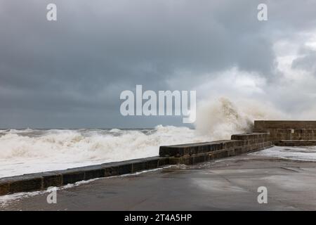 Lossiemouth, Moray, UK. 29th Oct, 2023. This shows the combination of extreme high tide, strong winds to flood Lossiemouth with Sea Foam. Credit: JASPERIMAGE/Alamy Live News Stock Photo