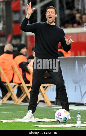 Leverkusen, Germany. 29th Oct, 2023. Xabi Alonso, head coach of Bayer 04 Leverkusen, instructs during the first division of Bundesliga 9th round match between Bayer 04 Leverkusen and SC Freiburg, in Leverkusen, Germany, Oct. 29, 2023. Credit: Ulrich Hufnagel/Xinhua/Alamy Live News Stock Photo