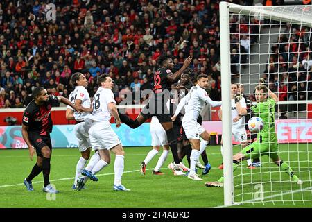 Leverkusen, Germany. 29th Oct, 2023. Manuel Gulde (2nd R, front) of SC Freiburg scores during the first division of Bundesliga 9th round match between Bayer 04 Leverkusen and SC Freiburg, in Leverkusen, Germany, Oct. 29, 2023. Credit: Ulrich Hufnagel/Xinhua/Alamy Live News Stock Photo