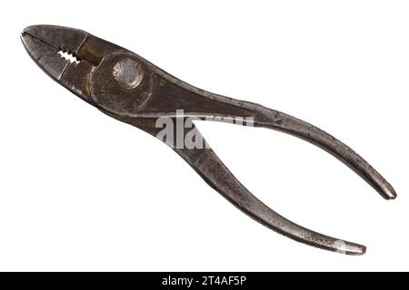 Antique vintage rusty wire pliers, or combination pliers or lineman's pliers isolated on white background. Stock Photo