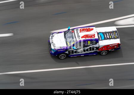 Gold Coast, Australia. 29 October, 2023. Bendix Racing's David Casey heading down towards the Thrifty Beach Chicane during the opening race of Sunday at the Boost Mobile Gold Goast 500. Credit: James Forrester/Alamy Live News Stock Photo