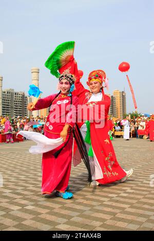 LUANNAN COUNTY - AUGUST 8: Yangko performances in the street on august 8, 2014, Luannan County, Hebei Province, China. Stock Photo