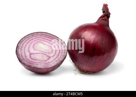 Whole and halved fresh red onion isolated on white background close up Stock Photo