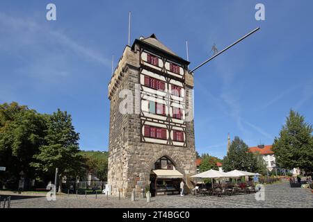 Gothic Schelztor built 1228 with restaurant, historic, city gate, city tower, pole, figure, Esslingen, Baden-Wuerttemberg, Germany Stock Photo