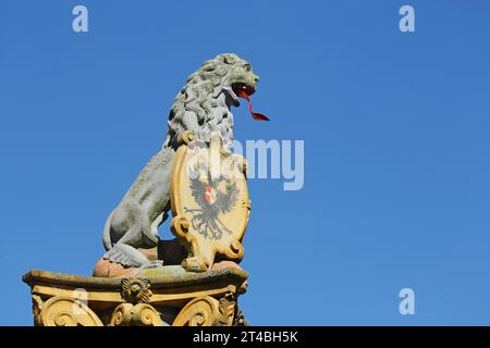 Lion figure with shield and double eagle from the lion fountain built in 1773, coat of arms, red tongue, sticking out, mouth, open, free-standing Stock Photo