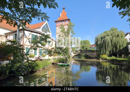 Historic Beinsteiner Tor built 1491 on the Rems, bridge, bank, idyll, houses, reflection, city gate, city tower, Waiblingen, Baden-Wuerttemberg Stock Photo