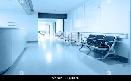 Empty nurses station and corridor in a hospital Stock Photo