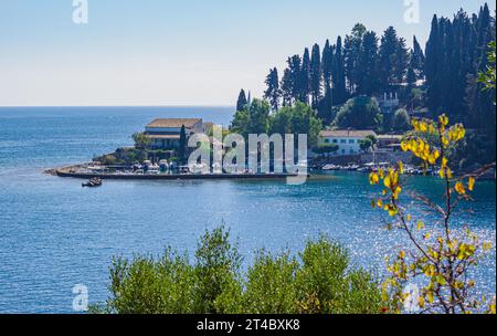 The pretty little fishing harbour of Kouloura on the north-east coast of Corfu in the Ionian Islands of Greece Stock Photo