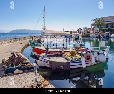 The pretty little fishing harbour of Kouloura on the north-east coast of Corfu in the Ionian Islands of Greece Stock Photo