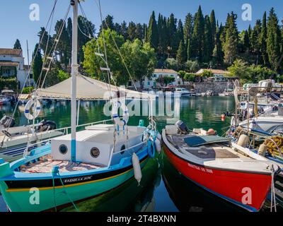 The pretty little fishing harbour of Kouloura on the north-east coast of Corfu in the Ionian Islands of Greece Stock Photo