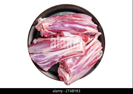 Raw lamb leg shanks in a steel tray with herbs. Isolated on white background Stock Photo