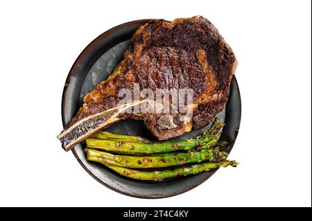 BBQ Grilled Tomahawk or Cowboy with bone beef steak, roasted asparagus. Isolated on white background Stock Photo