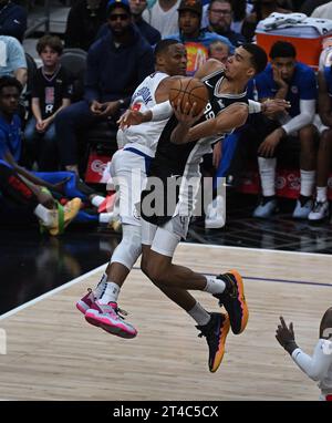 Los Angeles, United States. 29th Oct, 2023. San Antonio Spurs center Victor Wembanyama lays the ball up past Los Angeles Clippers Russell Westbrook during second half action at Crypto.com Arena in Los Angeles, California Sunday October 29, 2023. The Clippers beat the Spurs 123-83. Photo by Jon SooHoo/UPI Credit: UPI/Alamy Live News Stock Photo