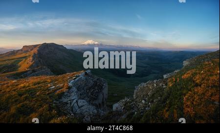 Morning landscape on peaks of Mount Elbrus. Big high mountain covered with snow, Caucasus Mountains, Russia Stock Photo