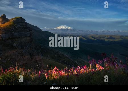 Morning landscape on peaks of Mount Elbrus. Big high mountain covered with snow, Caucasus Mountains, Russia Stock Photo