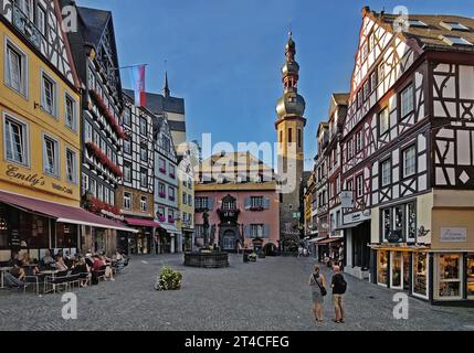 half-timbered houses on the market square with the town hall and St. Martin's parish church, Germany, Rhineland-Palatinate, Cochem Stock Photo