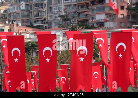 Lots of Turkish flags with building background. Turkey national day republic day indepence day concept. Stock Photo