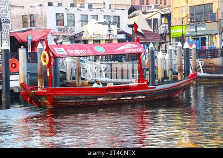 29th October 2023, Dubai, UAE. An early morning from Dubai Abra with traditional building and boats. Its a common man travel mode and for tourists. Stock Photo