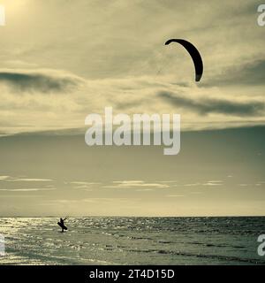 Solitary kite surfer on St Annes beach,UK Stock Photo