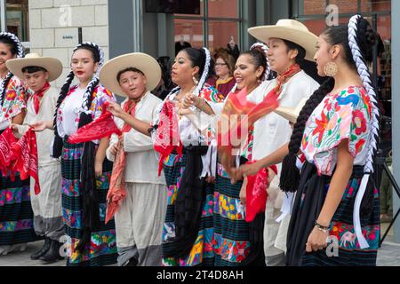Detroit, Michigan - The Ballet Folklorico Moyocoyani Izel performs during the Day of the Dead celebration at Valade Park on the Detroit Riverfront. Stock Photo