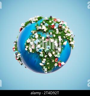 A view of the earth's globe with every kind of garbage appears on the land covered with green grass. Plastic, glass and metal trash materialize on the Stock Photo