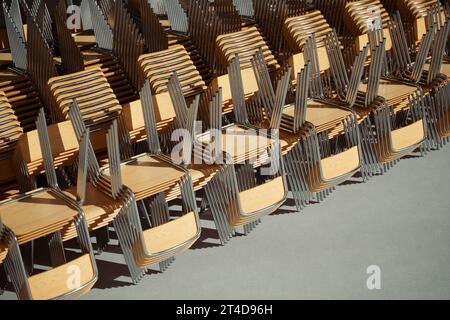 A classroom filled with chairs and tables. Perfect for educational materials, back-to-school campaigns, and learning-related projects. Waiting for stu Stock Photo