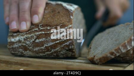 Traditional Bread Slicing with speed ramp Stock Photo - Alamy