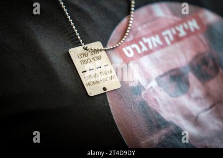 Daniel Elgarat a relative of hostages in Gaza, wears a necklace with the text 'bring them home-now!' during a meeting with the Danish press in the Danish Parliament Christiansborg in Copenhagen, Monday October 30, 2023. The meeting was organized by ' The Missing Hostages Family Forum' and politician Rasmus Stoklund from the Social Democrats. Ritzau Scanpix was invited to the event by the Israeli embassy in Denmark. *Note: Coverage includes images of hostages. Special rules may apply and there may be individual guidelines for publishing these*. Stock Photo