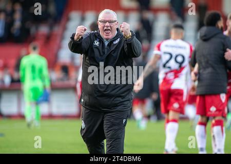 Football manager Steve Evans animated and cheering after winning game whilst head coach at Stevenage Football Club Stock Photo