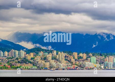 Rain storm over North Shore skyline and Vancouver Harbor, Vancouver, British Columbia, Canada. Stock Photo