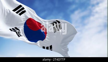 Close-up of national flag of South Korea waving on a clear day. White field, red-blue Taegeuk center, four black trigrams. 3d illustration render. Sel Stock Photo