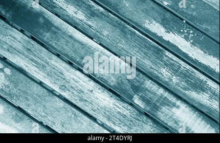 Front view of diagonal pattern of grunge indigo blue painted wood plank Stock Photo