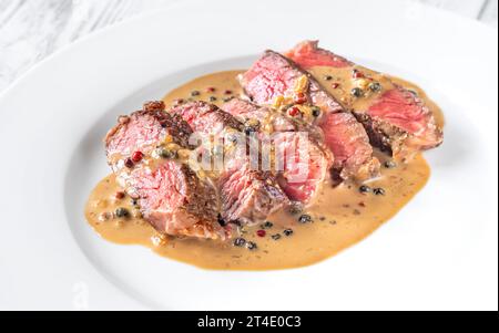 Steak au poivre - french steak with peppercorn sauce Stock Photo