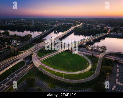 Lower Trenton Bridge NJ  - Aerial view of the illuminated Lower Trenton Bridge during the blue hour of twilight. Stock Photo