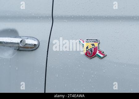 Bordeaux, France - April 26, 2023: Fiat Abarth logo on a light gray car body. Close-up. Stock Photo