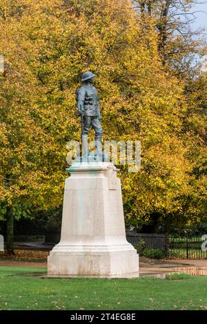 The King's Royal Rifle Corps War Memorial outside Winchester Cathedral with autumn colours, Hampshire, England, UK Stock Photo