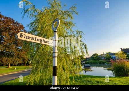 Signpost near the Listed duck pond on the roundabout in Otford Kent. Stock Photo