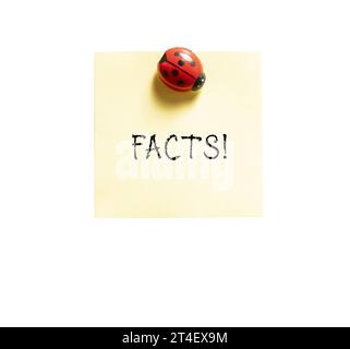 a colored memo sheet with writing  facts on a transparent background Stock Photo