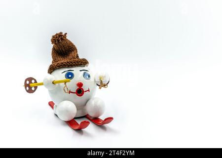 Closeup of a original handcarved wooden German Christmas Smoking Man figurine on a white background Stock Photo