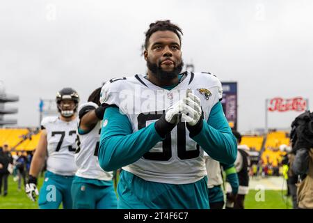Jacksonville Jaguars defensive end Angelo Blackson (90) lines up before an  NFL football game against the Houston Texans, Sunday, Sept. 24, 2023, in  Jacksonville, Fla. (AP Photo/Gary McCullough Stock Photo - Alamy