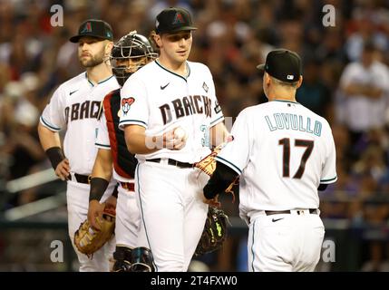 https://l450v.alamy.com/450v/2t4fxw0/phoenix-united-states-30th-oct-2023-arizona-diamondbacks-manager-torey-lovullo-takes-the-ball-from-starting-pitcher-brandon-pfaadt-as-he-is-taken-out-of-the-game-in-the-sixth-inning-against-the-texas-rangers-in-game-three-of-the-2023-world-series-at-chase-field-in-phoenix-arizona-on-monday-october-30-2023-photo-by-john-angelilloupi-credit-upialamy-live-news-2t4fxw0.jpg